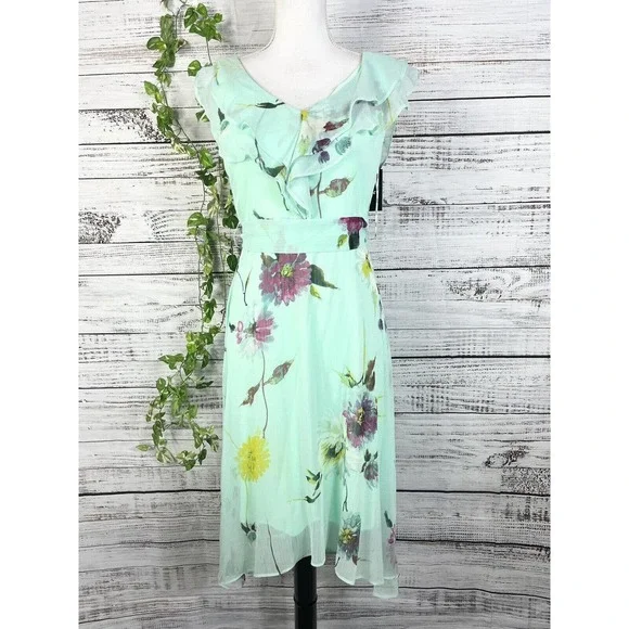 slim fit dress slacks Donna Karan Women's Chiffon Pleated Floral A-Line Dress - Midnight Green Multi